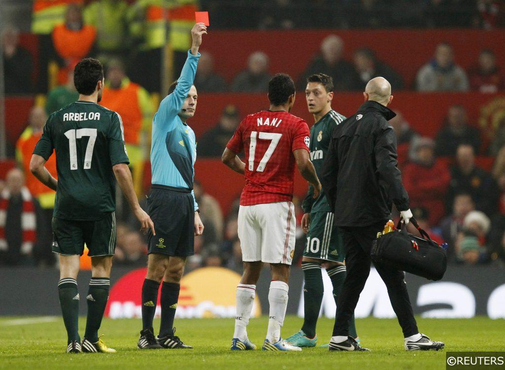 Cuneyt Cakir sends off Nani in the Champions League
