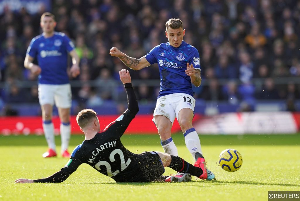 Everton defender Lucas Digne tackled